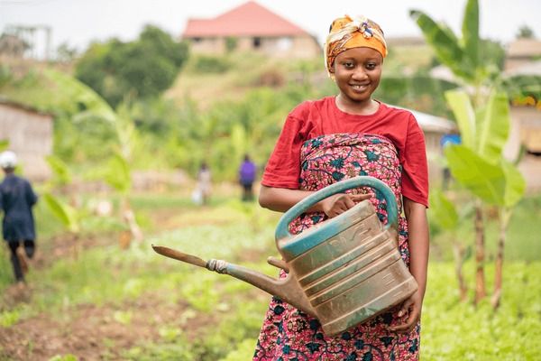 Women in African Agriculture: Bright Garments and Heavy Hoes
