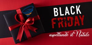 Top view of black christmas boxes with red ribbon on black background with copy space for text. black Friday and Boxing Day composition.
