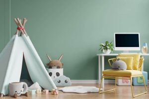 kids bedroom with green color background and toys