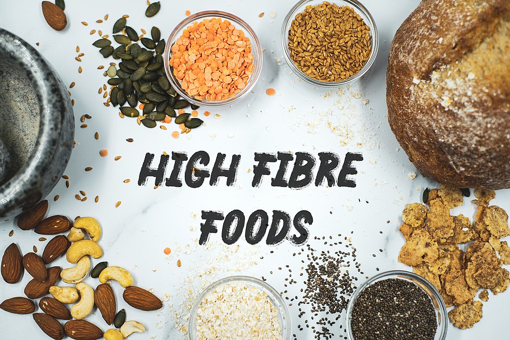What is fibre? Fibre is the part of plant foods, such as fruits, vegetables, and grains, that our bodies can't digest or break down. There are two different kinds of fibre: soluble and insoluble. Soluble fibre: when put in water, it turns into a gummy gel. It can make it take longer for food to move from the stomach to the intestines. Dry beans, oats, barley, bananas, potatoes, and the soft parts of apples and pears are all good examples. Insoluble fibre: Because it doesn't dissolve in water, it is often called "roughage." It soaks up water, which makes stools softer and bulkier. This helps keep bowel movements regular. Whole bran, products made from whole grains, nuts, corn, carrots, grapes, berries, and the peels of apples and pears are all examples. Types of dietary fibre 1. Cellulose Broccoli, cabbage, kale, and cauliflower are excellent sources of cellulose. Cellulose goes through the GI tract intact, binding to other dietary components and moving things ahead. It promotes gut bacteria proliferation, which maintains the digestive system healthy (this healthy gut flora is crucial in preventing bad bacteria from staging a coup and causing illness). Legumes, nuts, and bran also contain cellulose. 2. Inulin Soluble fibres like inulin slow digestion, making you feel full longer. This means your body absorbs sugar from foods more slowly, preventing blood sugar spikes (and the pesky junk food cravings that can strike because of them). Inulin isn't digested or absorbed in the stomach; it grows in the colon, encouraging GI health and general wellness. Inulin is found in wheat, bananas, garlic, onions, asparagus, and chicory root (like barley and rye). 3. Pectins Pectins are a form of soluble fibre that slows glucose absorption, preventing blood glucose spikes. They are well-digested by gut microbes and may decrease cholesterol by flushing out fatty acids. Apples, strawberries, citrus fruits, carrots, and potatoes contain a lot of pectins, while legumes and nuts contain less. 4. Beta-glucan Beta-glucan is a gel-forming soluble fibre fermentable by gut flora. Prebiotics provide "fuel" for beneficial gut bacteria. It may help increase fullness and manage blood sugar levels since it slows food exit from the stomach and intestines. Be ta glucan is present in oats, barley, shiitake, and reishi mushrooms. 5. Psyllium Psyllium, a soluble fibre, relieves constipation by softening faeces. It generates a gel that binds to carbohydrates and prevents cholesterol reabsorption. Because psyllium is the food source itself, you'll only find it as a supplement or a component in other foods, such as high-fibre cereals. 6. Lignin lignin is an insoluble plant cell wall fibre like cellulose. Insoluble fibres may help reduce colon cancer risk. It speeds up digestion, minimizing carcinogens' time to interact with tissue. Whole grains (wheat and maize bran), legumes (beans and peas), vegetables (green beans, cauliflower, zucchini), fruits (avocado, unripe bananas), nuts, and seeds contain lignin (flaxseed). 7. Resistant starch Resistant starch acts like soluble, fermentable fibre to nourish gut flora. This means it passes into the large intestine, where it helps defend against dangerous microorganisms. It helps weight loss by reducing appetite and blood sugar spikes, heart health by lowering cholesterol, and digestive health by keeping things normal. Beans and oatmeal flakes are good sources of resistant starch when they are unripe. Dietary fibre sources Different plant foods have different amounts of fibre, and the amount varies based on how old the plant is and what part of it is. For example, cellulose is found in a lot of the following: ●Root vegetables ●Leafy vegetables ●Legumes or pulses ●Apples and pears Strawberries and peaches have a lot of lignin fibre, while citrus fruits have a lot of pectins. Both cellulose and hemicellulose can be found in cereals and grains. Therefore, all these sources of dietary food we can consume and get fibre to our bodies. How does dietary fibre benefit? 1. Helps to maintain bowel movements regular. Stool bulk and softness are both improved by a diet high in dietary fibre. Constipation is less likely to happen if you have big stools that are easy to pass. If you have loose, watery stools, fibre may help to make them more solid because it absorbs water and adds bulk to stool. 2. The immune system and mental health are boosted by it. Fibre is a good prebiotic because it provides the good bacteria that live in our digestive system and make up the gut bacteria. The more gut bacteria in our microbiota, the more our bodies benefit. A healthy microflora in the gut has been linked to better immunity, Gastrointestinal health, anxiety, depression, diabetes, and also being overweight or obese. 3. It lowers the risk of diabetes as well as its effects. Soluble fibre can help to prevent getting type 2 diabetes and can also help in treating those who already have it. This is because regular consumption of soluble fibre improves blood sugar levels, insulin resistance, and metabolic attributes. By slowing digestion, soluble fibre prolongs the process of converting carbohydrates into energy. This retains blood sugar from quickly rising. 4. It helps you lose weight. Fibre will help in losing weight by maintaining a feeling of a full stomach for a longer period of time. Also, foods that naturally contain fibre, like fruits, vegetables, and whole grains, are full of vitamins and minerals and tend to be lower in calories. This helps make a healthy diet, which is needed to lose weight. 5. Protect from getting piles To get rid of hard stools, have to pressure and work at it. It causes piles by putting more pressure on the veins in the lower part of the large intestine, called the rectum. Both soluble and insoluble fibres make it easier for stools to move through the digestive tract. This eases constipation, relieves straining, and lowers the risk of getting piles. 6. Helps to protect skin health Dietary fibres bind to fungus and yeast in the digestive tract, which is then passed out of the body in faeces. This stops them from departing the body through the skin and prevents it from getting acne or rashes. Can consume too many high-fibre foods affect health? Too much fibre can be bad for health. If eating more fibre than you should, you could get diarrhoea, bloating, and gas. Mineral binding is a condition in which the body loses minerals instead of absorbing them. Calcium is the mineral in the body that is most likely to bind with other minerals. For better health, if you want to try fibre supplements first consult the doctor and start taking fiber supplements to maintain good health. So, after consulting a doctor, if you wish to buy online health supplements then you can try Truemeds. It is an online medicine pharmacy which offers free home delivery in PAN India. They also provide free Dr. consultations and if you buy the medicine that Trumeds’s Dr. recommended, you can save up to 72% on your total bill. You can also check if they are having any coupons or discounts. If you are a first-time user then you can apply the MED25 coupon to get a 25% discount.