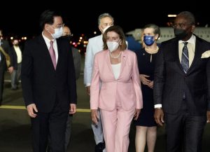 epa10102886 A handout photo made available by the Taiwan Ministry of Foreign Affairs shows US House Speaker Nancy Pelosi (C) being greeted by Taiwan Foreign Minister Joseph Wu (L) as she arrives at the Songshan airport in Taipei, Taiwan, 02 August 2022. Pelosi landed in Taiwan in the evening of 02 August, the highest ranking US official to visit the island in 25 years, despite strong warnings from China against the visit.  EPA/Taiwan Ministry of Foreign Affairs HANDOUT  HANDOUT EDITORIAL USE ONLY/NO SALES