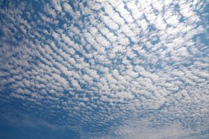 Cirrocumulus Cloud in blue sky on sunny peaceful day.