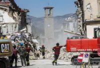 Fire Brigades operate near Civic Tower, in the earthquake-stricken town of Amatrice, Lazio region, five days after the devastating eathquake that hit central Italy, 29 August 2016. The latest provisional death toll from the 24 August earthquake is 290. ANSA/ MASSIMO PERCOSSI