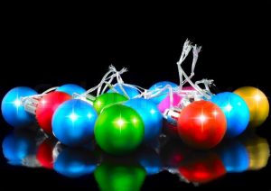 2052919-christmas-and-new-year-decoration-coloured-balls-on-the-black-background