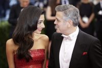 George Clooney and Amal Alamuddin arrive on the red carpet at the Costume Institute Benefit at The Metropolitan Museum of Art celebrating the opening of China: Through the Looking Glass in New York City on May 4, 2015.     Photo by John Angelillo/UPI - Infophoto